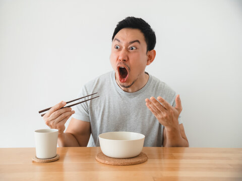 Asian man shocked by explosive flavor, dramatic reaction