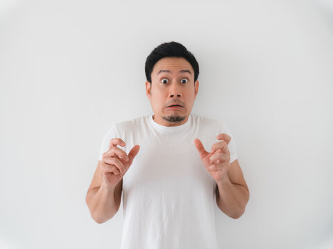 Tense individual portraying surprise and emotional openness
