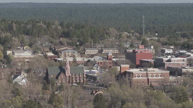 Zoom aerial view of NAU campus in Flagstaff Arizona in springtime