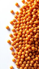 Fototapeta premium Perfectly formed fish food pellets; pristine arrangement on stark white backdrop , small, pet food
