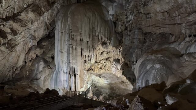 Interior of a cave in Abkhazia, showing large underground chambers and stalactite formations.