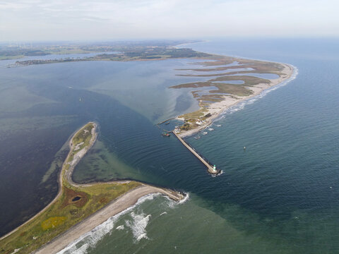 Stunning coastal landscape: Aerial view of the Schlei mouth and lighthouse at the Baltic Sea, Olpenitz, Germany