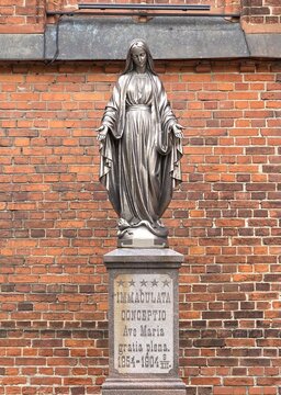 The statue of the Virgin Mary in the courtyard of the Kaunas Cathedral Basilica of Apostles St. Peter and St. Paul