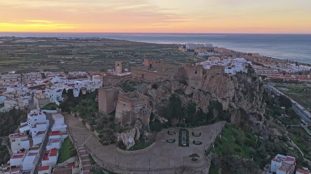 Salobrena castle aerial view at sunrise over the spanish coast