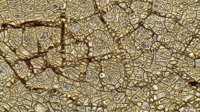 Aerial view of dry cracked ground with intricate mineral patterns and earthy textures in Minas de Riotinto, Andalusia, Spain.
