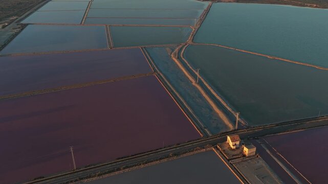Aerial view of salinas de santa pola salt flats in spain at sunset