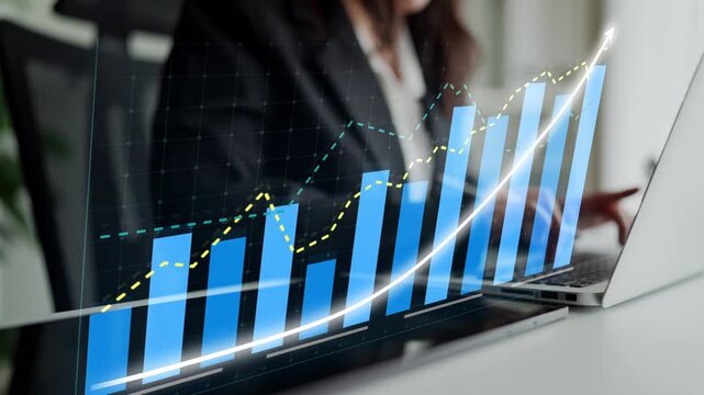 A professional analyzing growth data on a laptop in a modern office setting, showcasing graphs and charts that illustrate financial trends and insights. Copula