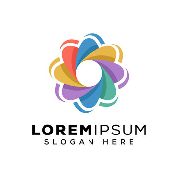 The image showcases a vibrant spiraling logo design featuring multiple colors, representing interconnectedness and creativity, suitable for businesses focused on innovation and design.