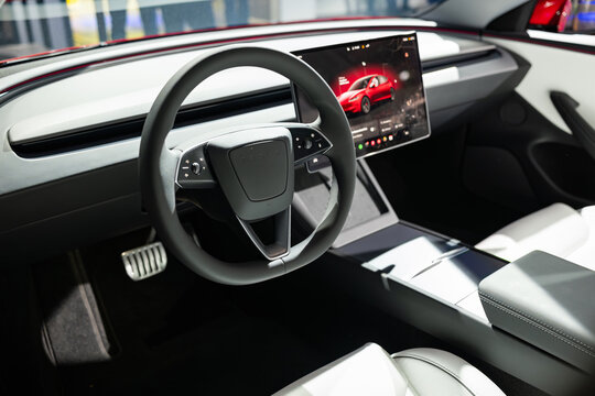 Zurich, Switzerland, October 10, 2025. Interior view of the minimalist cockpit in a Tesla Model 3 Performance electric sedan