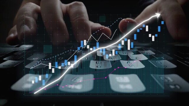 Close-up of hands typing on a keyboard with an overlay of stock market graphs, showcasing rising trends and data analysis in a digital workspace environment. Copula