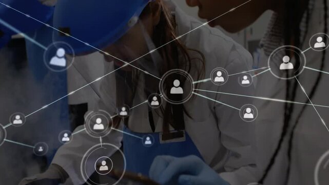 Gloved hands using scanner on tubes lab tech checking network overlay growing for sample tracking