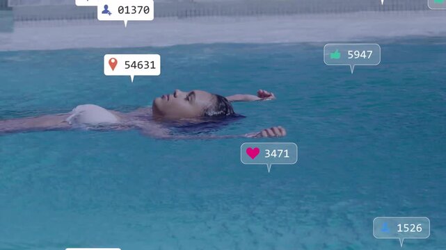 Teen girl floating in pool badges appearing via app clumping over her showing social media pressure