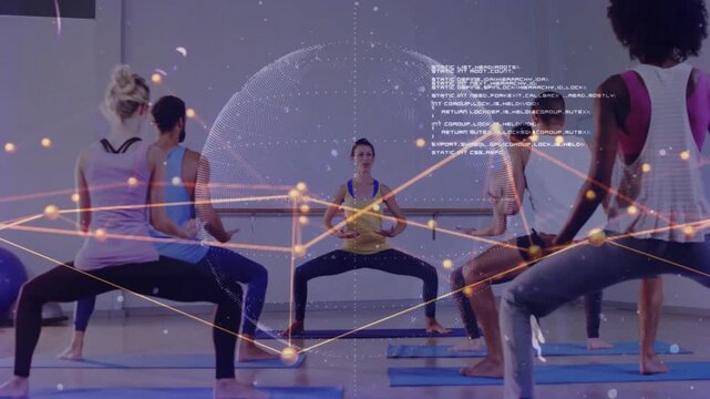 Fitness instructor shifting hands cueing class to mirror plie on mats as digital globe intensifies