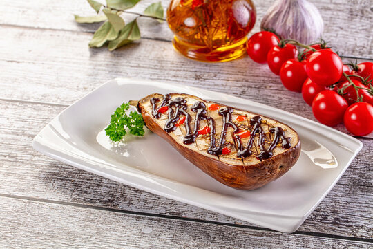 Baked eggplant half with teriyaki