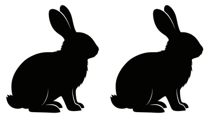 Fototapeta premium Two black rabbits facing opposite directions a striking silhouette