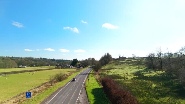 Scottish Borders UK: 7th March 2026: This scene shows a clear view of the landscape and small village near Langholm on the A7