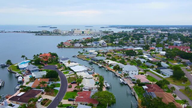 Dunedin Florida waterfront homes and canals connecting to the Gulf of Mexico with view of Dunedin Causeway