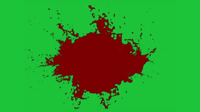 red paint splash spreading on green screen background liquid splatter animation seamless loop effect