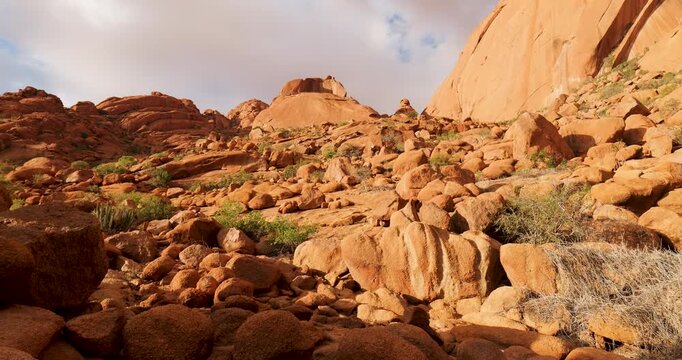 A stunning cinematic time-lapse of the iconic Spitzkoppe rock formations in Namibia during sunset.