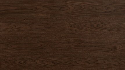 Rich brown wood texture showing wavy grain patterns ideal for backgrounds © Maruf