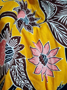 Traditional Indonesian Batik Fabric with Yellow and Floral Motif