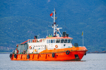 Fototapeta premium Vietnamese Coast Guard Service warship ship in coastal waters in sea in Nha Trang in Vietnam