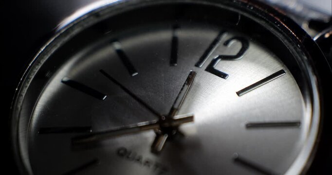 Clock face close-up. Countdown. Second hand moves on the clock. Time flies.