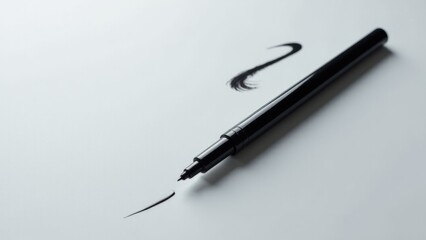 Fototapeta premium A close-up shot of a pen with a black marker, great for illustrating writing or creativity