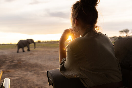 teen age girl experiencing a safari in the Okavango Delta, Botswana, Africa