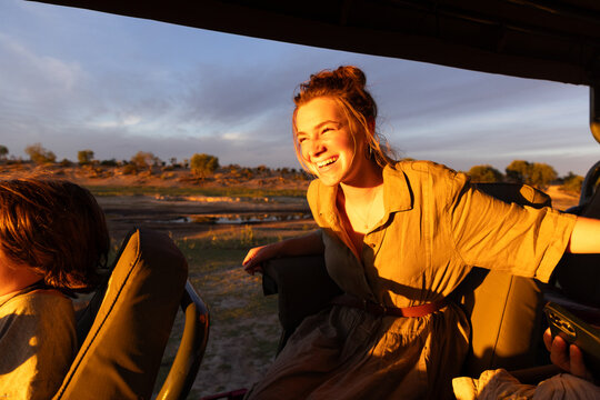 teen age girl experiencing a safari in the Okavango Delta, Botswana, Africa