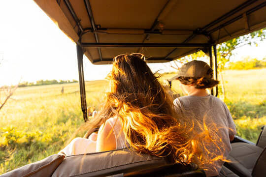 teen age girl experiencing a safari in the Okavango Delta, Botswana, Africa