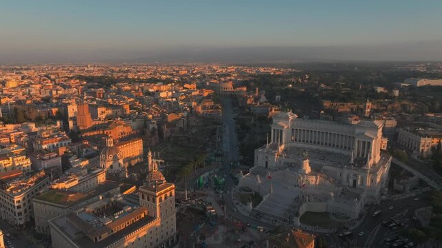 Rome Skyline Aerial drone at Golden Hour Sunset With Monument to Victor Emmanuel II And Historical Landmarks In Warm Light.