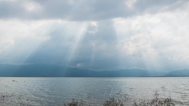Time-lapse of stunning Tyndall effect and god rays over Daguangba Lake, Dongfang, Hainan, China