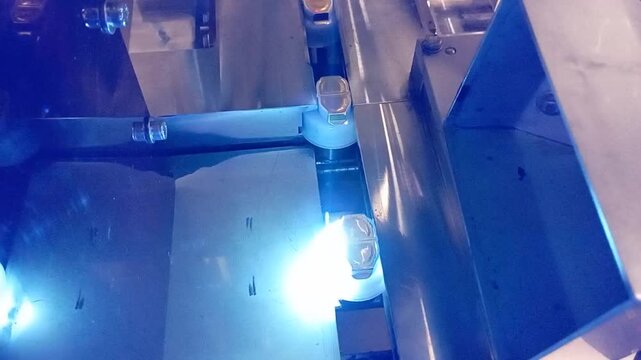 the process of providing a product number code on the infusion bottle cap using a laser machine