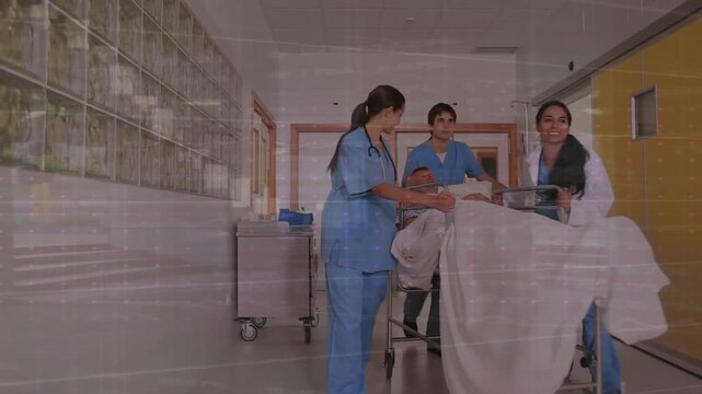 Caucasian doctors walking with patient in bed over cardiograph