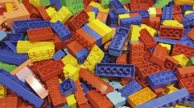 Colorful pile of interlocking toy bricks