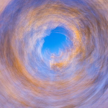 Low angle view of trees against sky, motion blur
