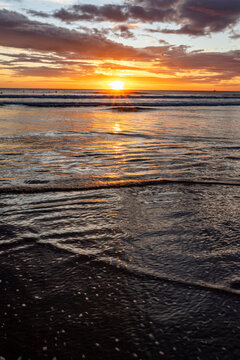 Calm ocean waves on Playa Grande sunset