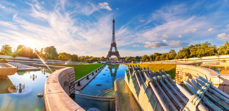 Trocadero Gardens Fountain and Eiffel Tower, beautiful sunset view of Paris, France