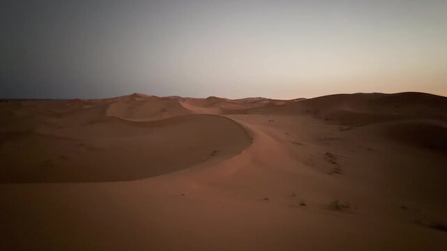 Stunning panoramic view of the vast Sahara Desert in Morocco with its iconic orange sand dunes, tc01
