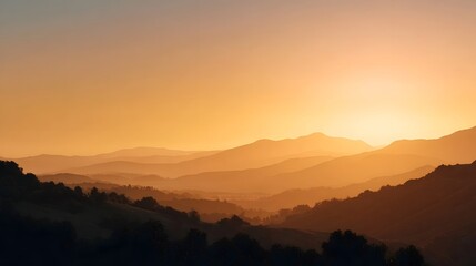 Obraz premium Layered mountain ranges bathed in the warm ethereal glow of sunrise or sunset