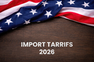 Fototapeta premium Import Tariffs increase concept with United States of America Flag on table