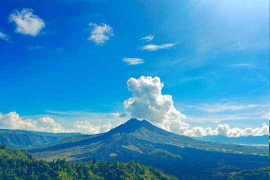 Kintamani, Bangli, Bali, Indonesia - March 25 2026: Mount Batur is an active volcano in Kintamani, Bangli, Bali, which is famous for its sunrise views and the largest caldera lake.