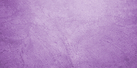Fototapeta premium A vintage pink and purple grunge wall background features an aged paper texture with a violet paint pattern on a blank textured canvas material for a light retro design backdrop
