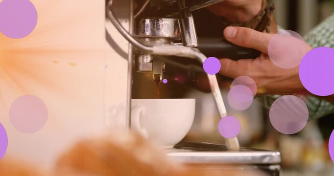 Animation of falling purple dots over barista making coffee