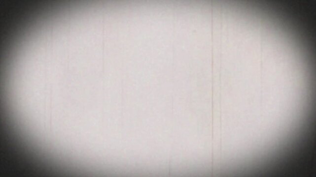 A video showcasing a close-up view of a white surface with scratches