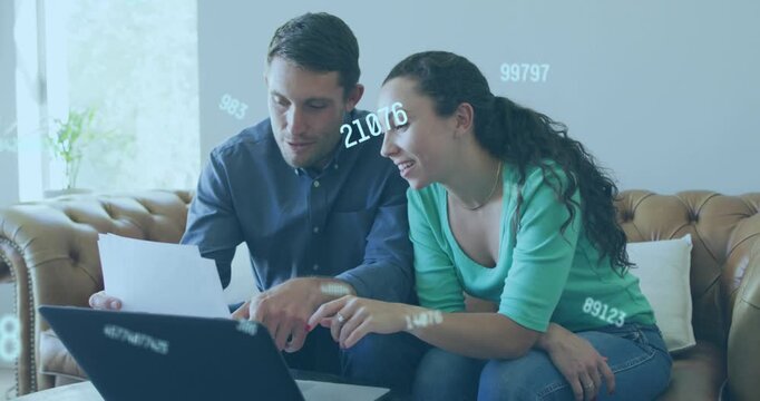 Animation of data processing over caucasian couple using laptop