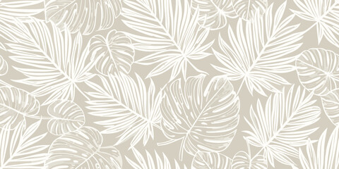 Elegant seamless pattern of tropical monstera and palm leaves © Ranajit