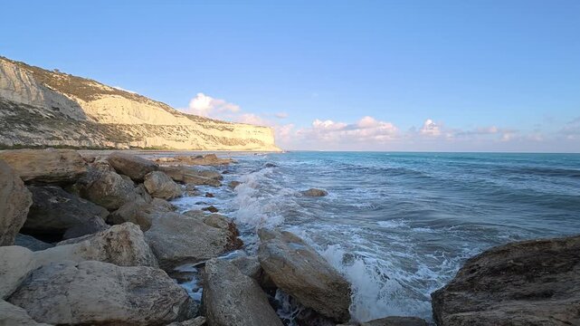 Zapallo Bay at Episkopi with white cliffs and waves crashing on rocks, Limassol district, Cyprus, 4k static shot
