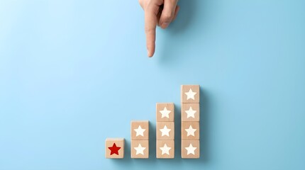 Balanced Hand Gesture Pointing at Red Star on Wooden Block Scale with Blue Contrast Lighting Minimalist Studio Setting